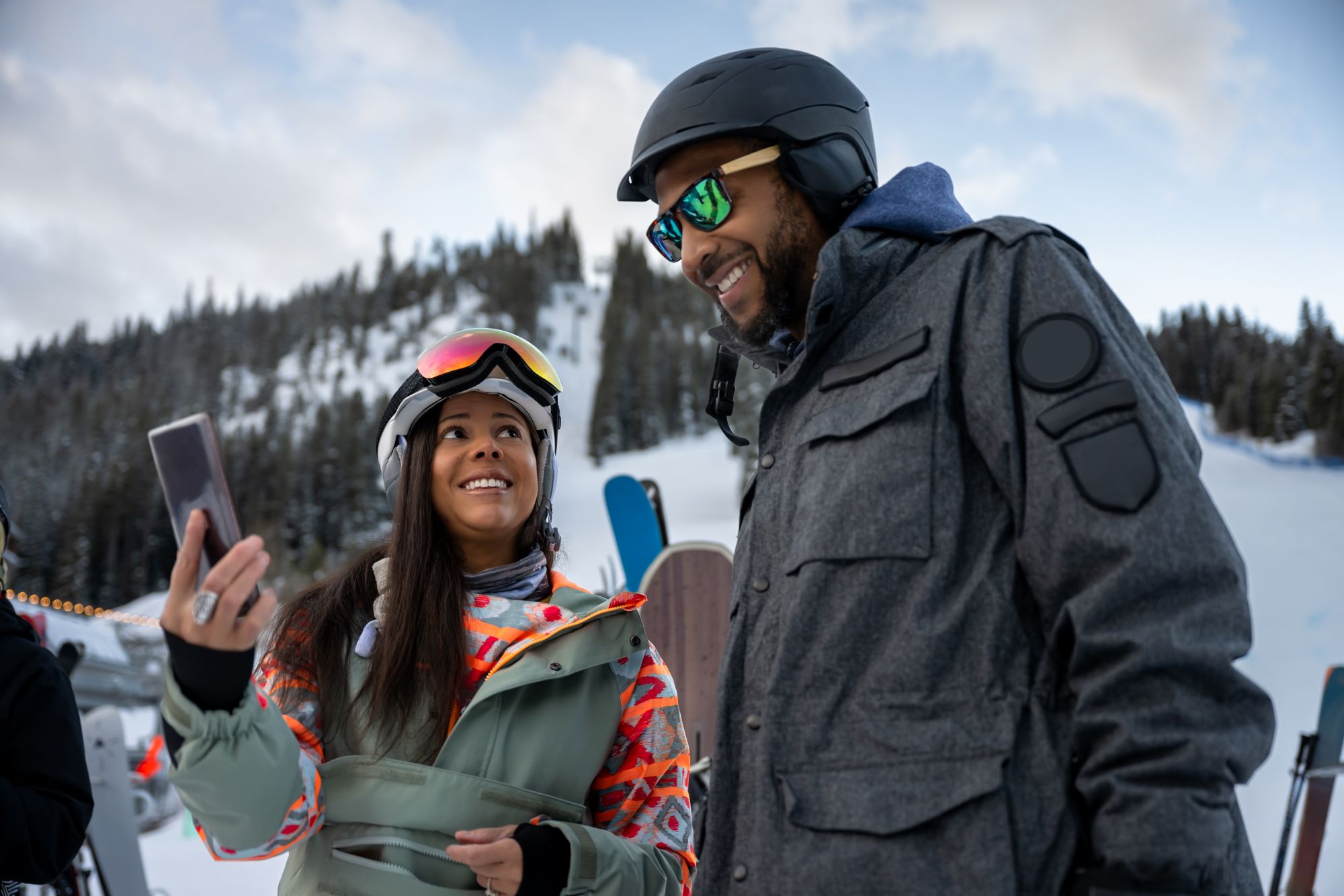 Two young people in the mountains; ?>