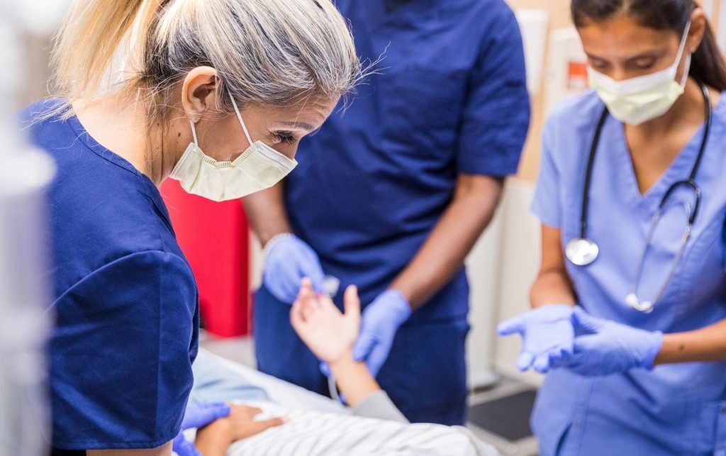 Picture of medical staff helping a patient at the Urgent Care Centre