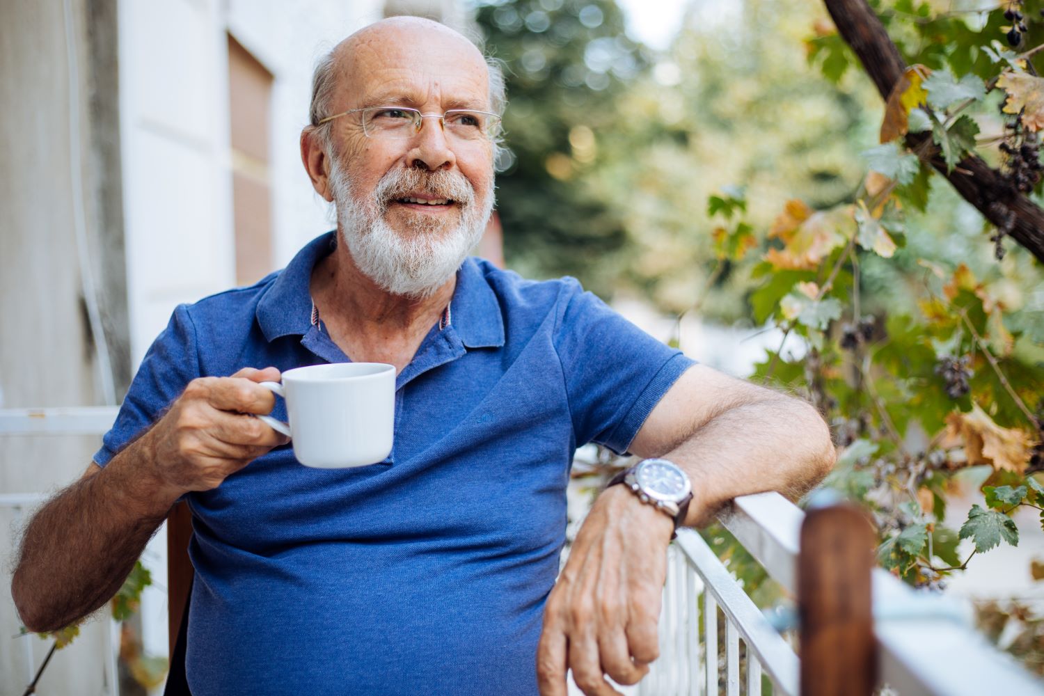 Older man drinking coffee